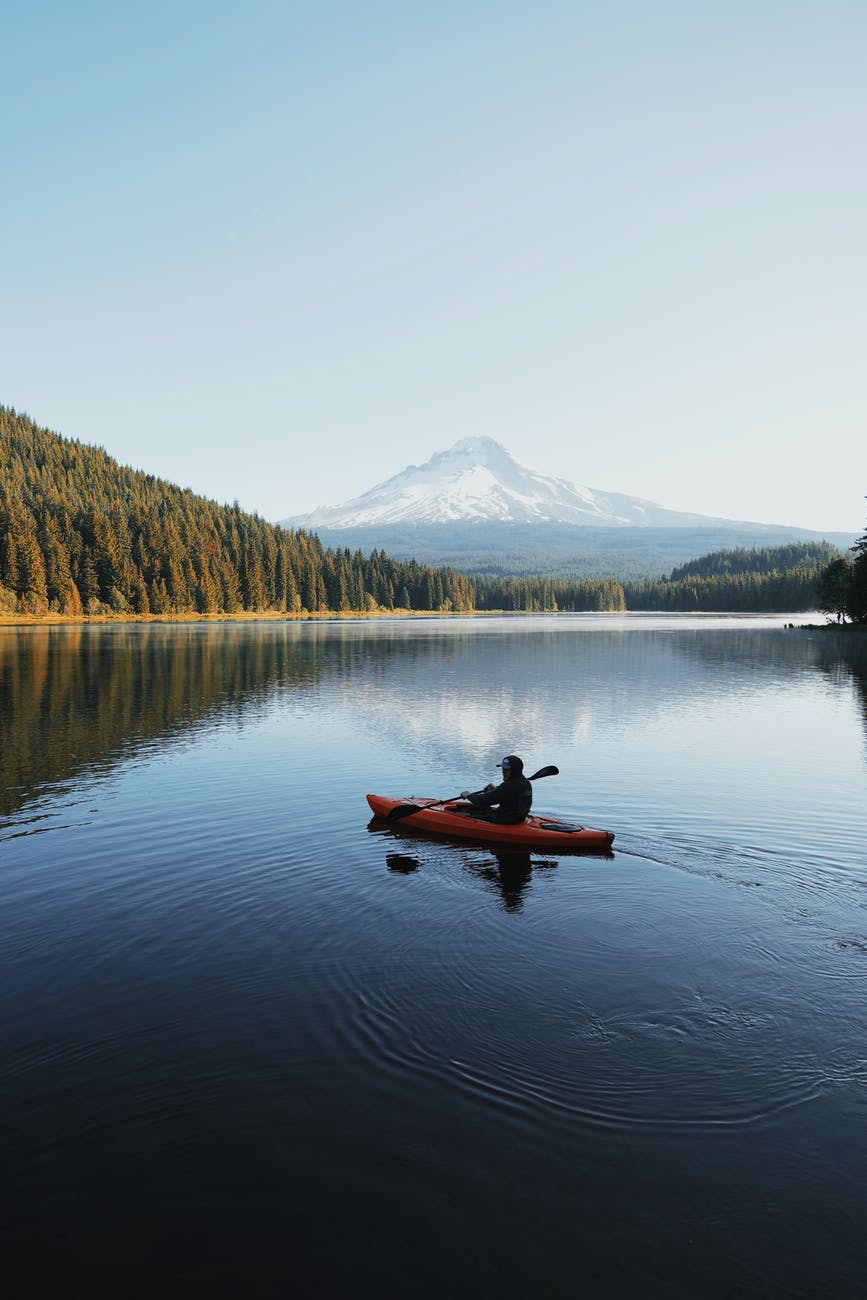 person riding kayak